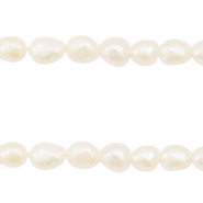 BQ Perle di acqua dolce pepita ovale 4-5x3-4mm bianco naturale