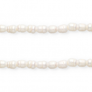 Perle di acqua dolce imperfette chicco di riso 11x9mm bianco naturale