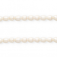Perle di acqua dolce imperfette chicco di riso 10x9mm bianco naturale