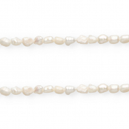 Perle di acqua dolce imperfette pepita ovale 7x5-6mm bianco naturale