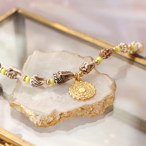 Idee per un look da spiaggia con i ciondoli e perline in metallo DQ