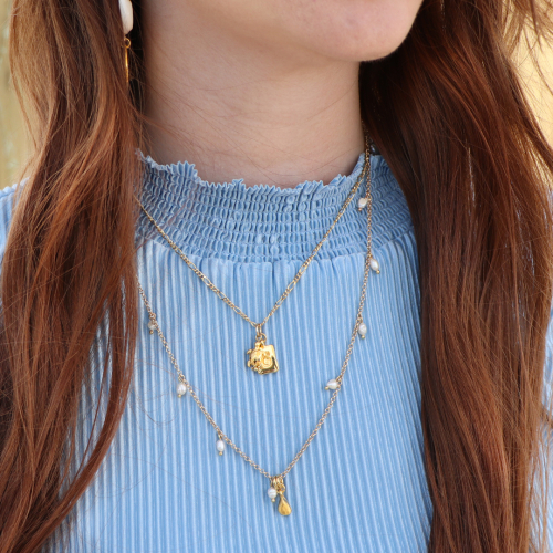 Mettiti all&rsquo;opera con i ciondoli di metallo DQ per una collezione da spiaggia perfetta