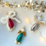 Crea design magici con perline Polaris a forma di goccia e dettagli d'angelo!